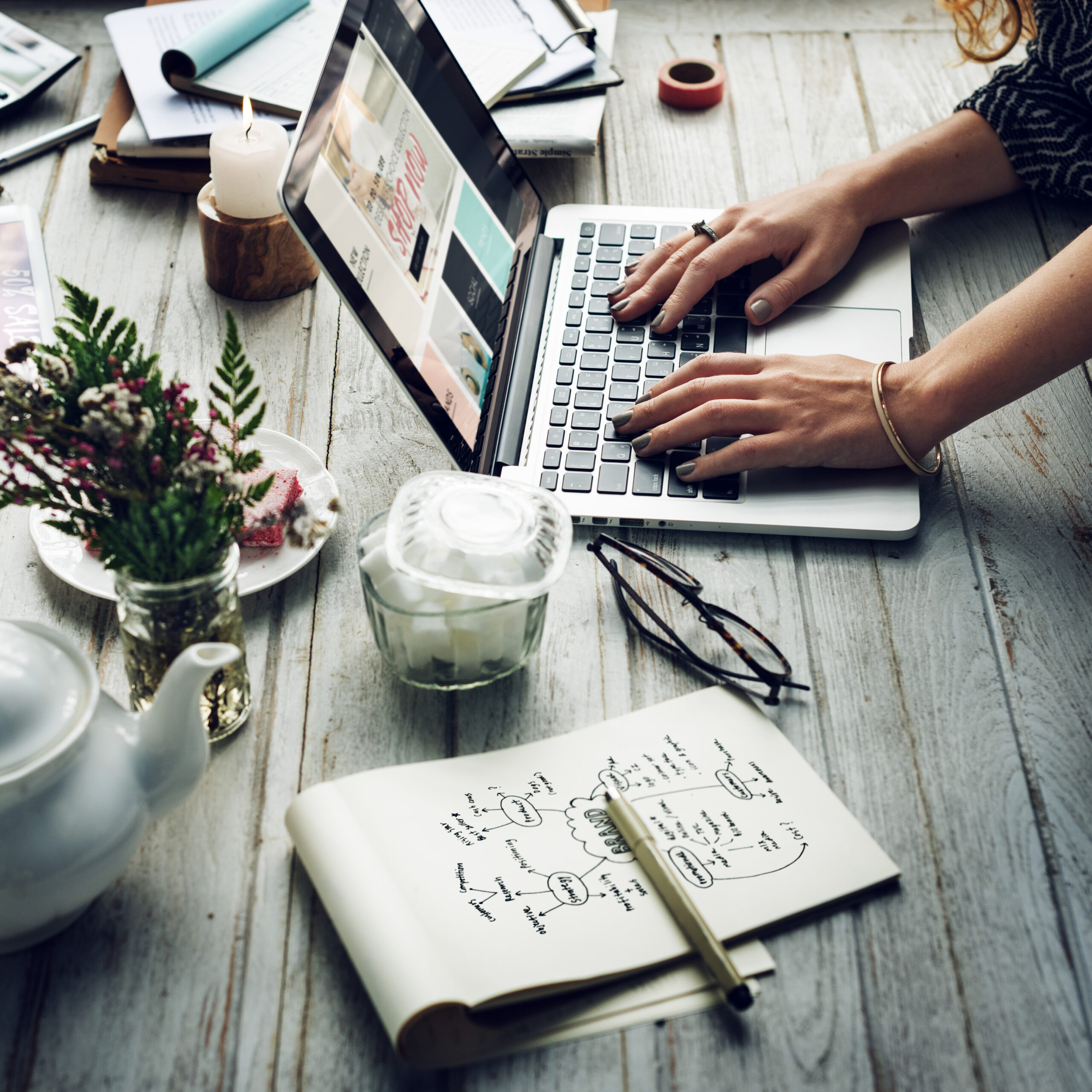 side view of woman using computer laptop